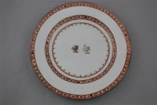 An English porcelain armorial plate and a French armorial breakfast cup, late 18th and late 19th century, 13cm. diam.